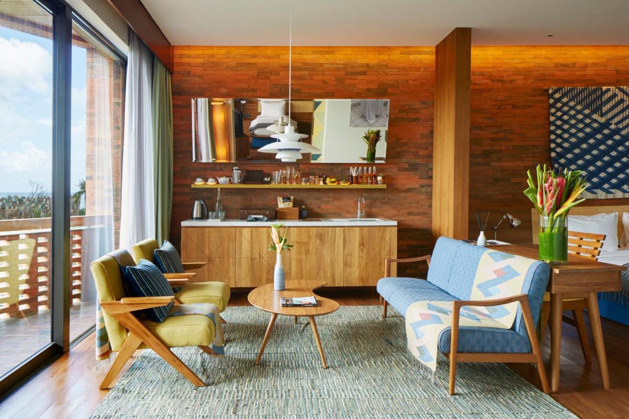 Potato Head Suites & Studios Seminyak Exterior foto A living room at the Standard East Village